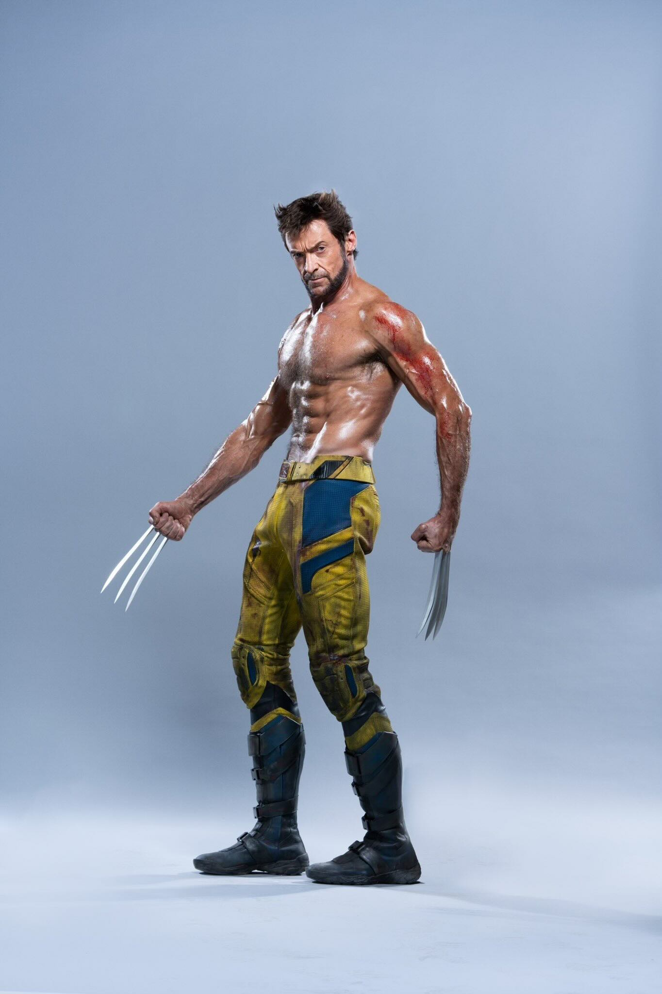 Hugh Jackman jako Wolverine nahoře bez