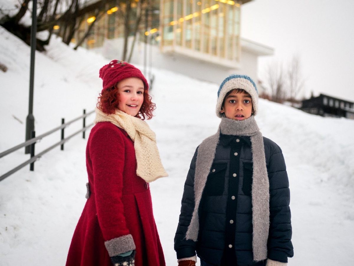 The Snow Sister. (L to R) CELINA MEYER HOVLAND as Hedvig, MUDIT GUPTA as Julian in The Snow Sister. 