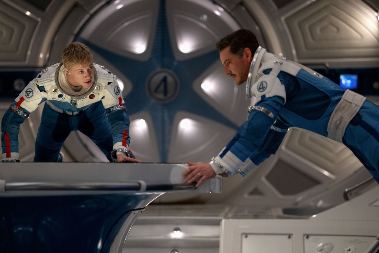Joseph Quinn as Johnny Storm/Human Torch and Pedro Pascal as Reed Richards/Mister Fantasticin 20th Century Studios/Marvel Studios' THE FANTASTIC FOUR: FIRST STEPS