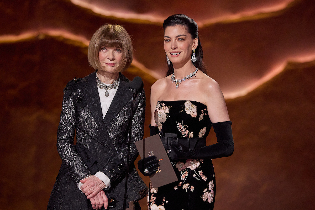 Dame Anna Wintour and Anne Hathaway present the Oscar® for Costume Design