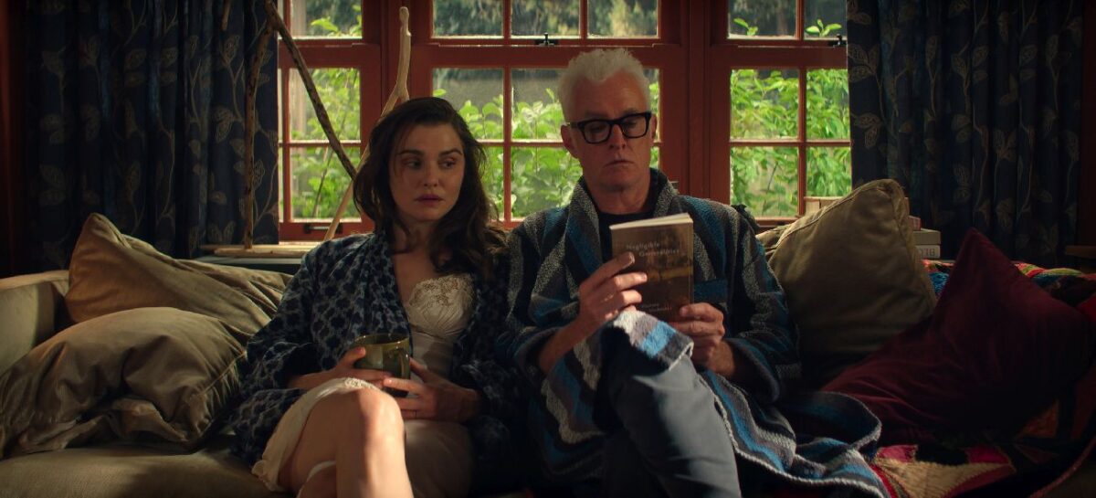 VLADIMIR. Rachel Weisz as The Protagonist and John Slattery as John
